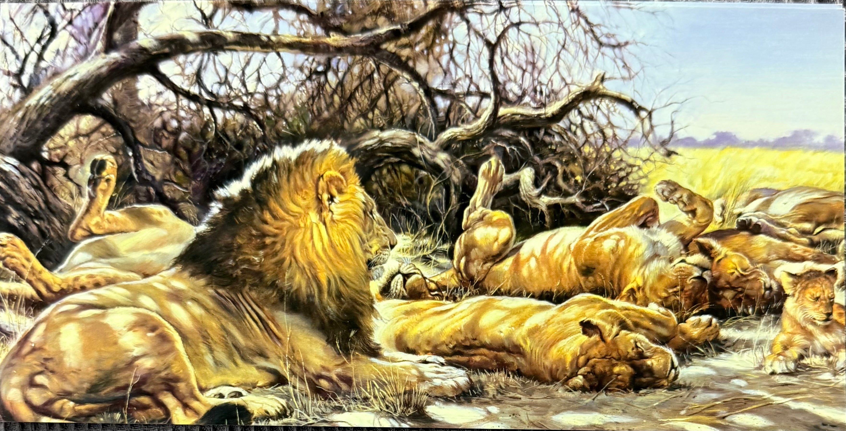 Group of lions resting in a natural setting with trees and grass.